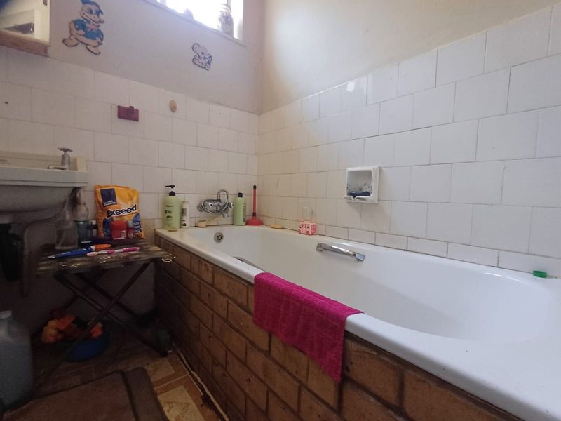 House For Sale in Stilfontein Ext 1 - Photo 7