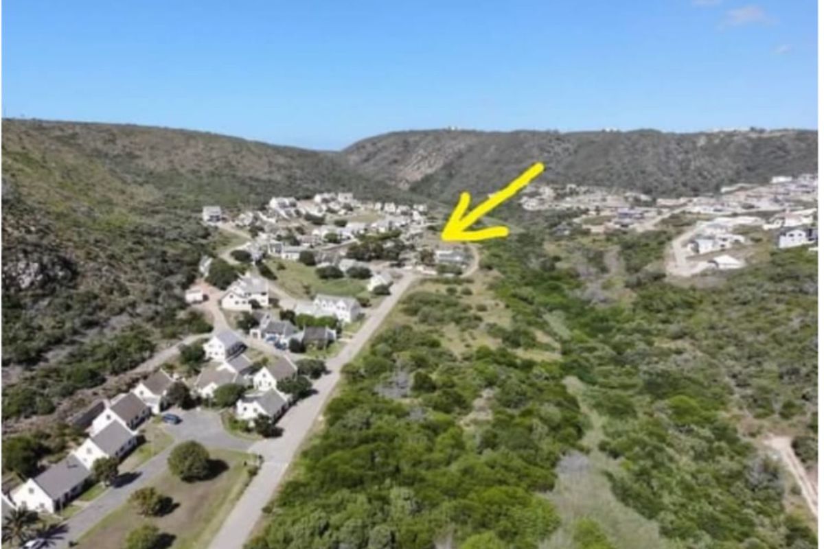 Aerial view of the farm estate showing the property location within the surrounding landscape and residential cluster.