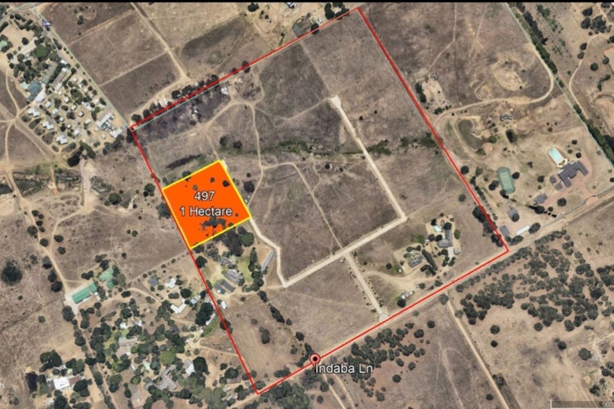 Aerial view of a one-hectare plot of land within a larger rural estate, highlighting the property boundaries and access via Indaba Lane.