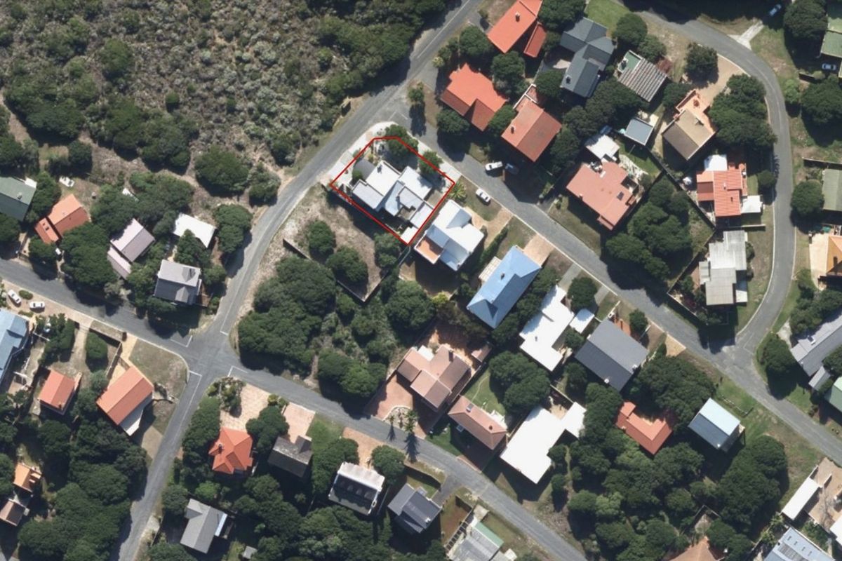 Aerial view of the property highlighting its position and layout within the surrounding residential neighborhood.