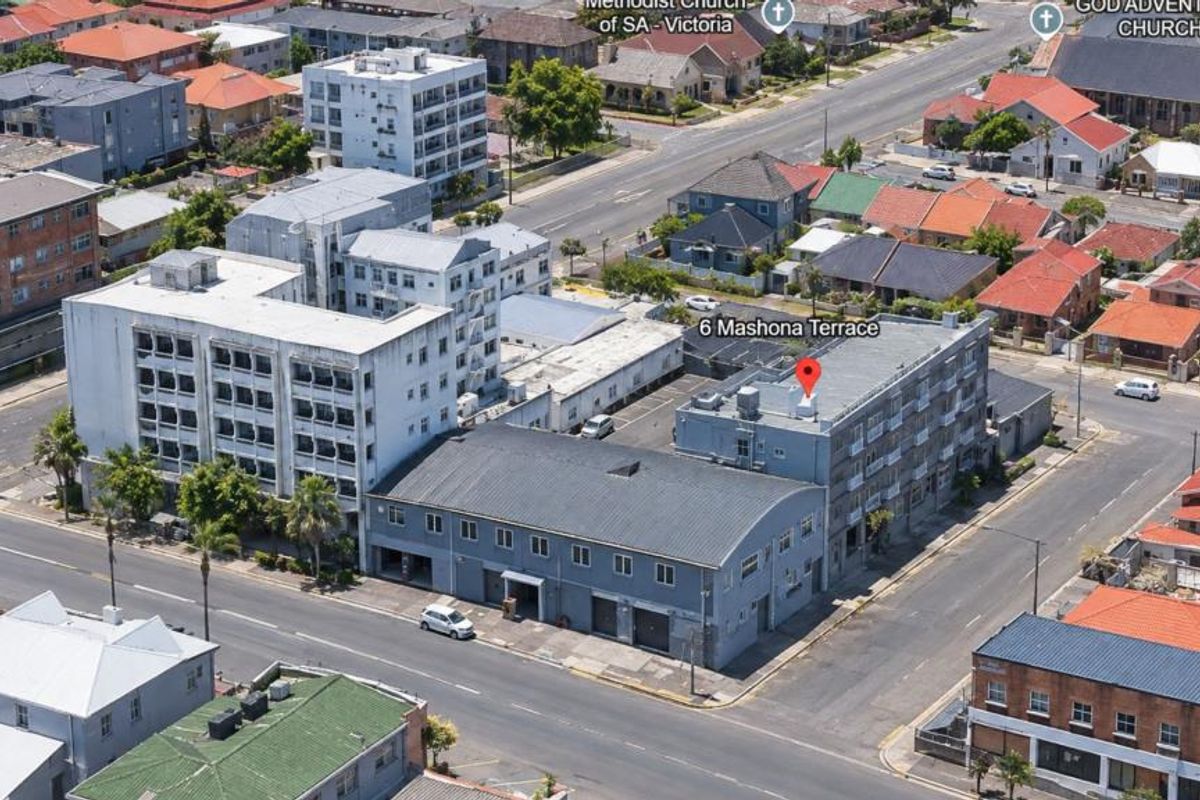 Aerial view of the apartment building located at 6 Mashona Terrace, showing the surrounding urban neighborhood and street layout.