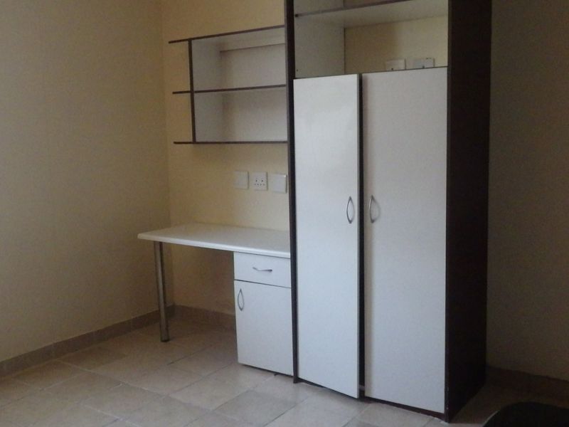 Modern Living at Its Finest: Stylish and Secure Unit Available Now - Photo 2