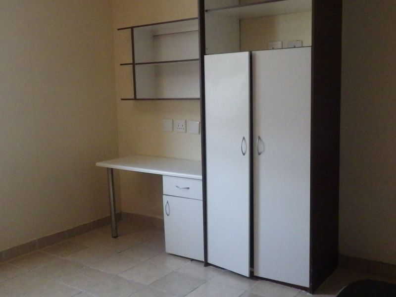 Modern Living at Its Finest: Stylish and Secure Unit Available Now - Photo 3
